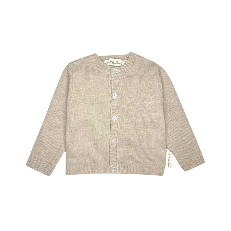 A sophisticated image highlighting "The Classy Cardigan," a garment that embodies effortless elegance with its refined design. This versatile cardigan adds a touch of sophistication to any ensemble, making it a wardrobe essential for timeless style.