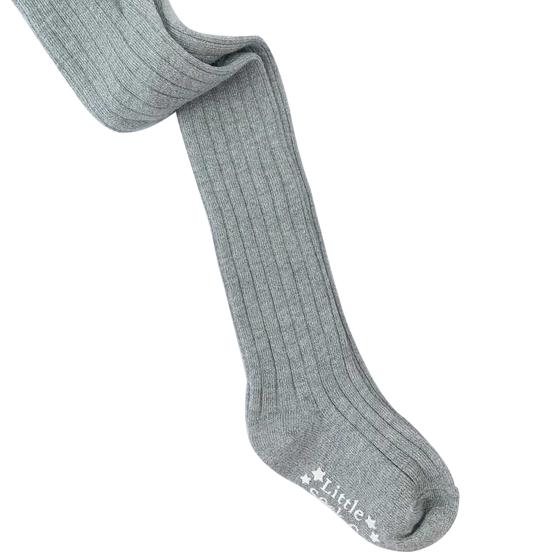 A delightful image showcasing "The Glitter Rib Tights," adorable children's tights with a ribbed texture and a touch of sparkling glitter. These tights add a playful and stylish element to any little one's outfit.