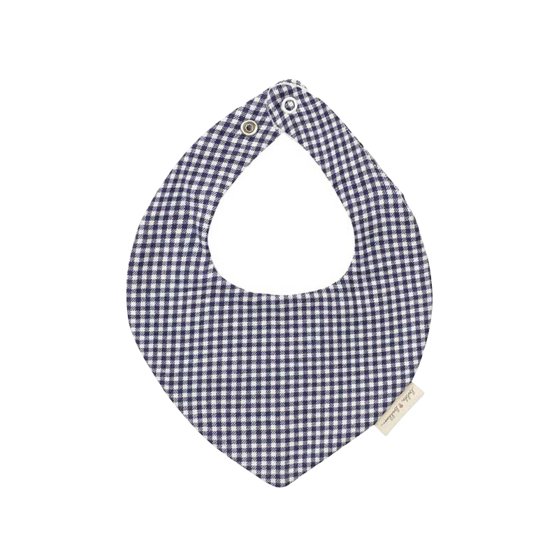 A sophisticated image featuring "The Vichy Neck Scarf," a stylish accessory adorned with a timeless checked pattern. This versatile scarf adds a touch of elegance to any outfit, making it a chic and classic addition to your accessory collection.