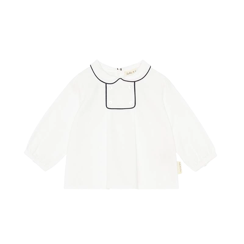 A sophisticated piped blouse in crisp white, showcasing meticulous tailoring and elegant design. This versatile garment effortlessly combines professionalism with a touch of modern flair, perfect for any fashion-forward wardrobe.