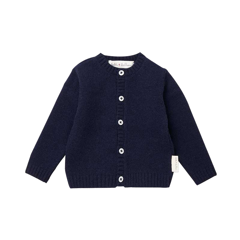 A sophisticated image highlighting "The Classy Cardigan," a garment that embodies effortless elegance with its refined design. This versatile cardigan adds a touch of sophistication to any ensemble, making it a wardrobe essential for timeless style.