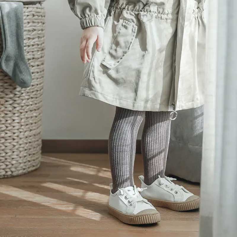 An assortment of ribbed baby tights in delightful pastel colors, providing both warmth and style for your little one. The textured design adds a charming touch to these adorable and comfortable baby essentials.