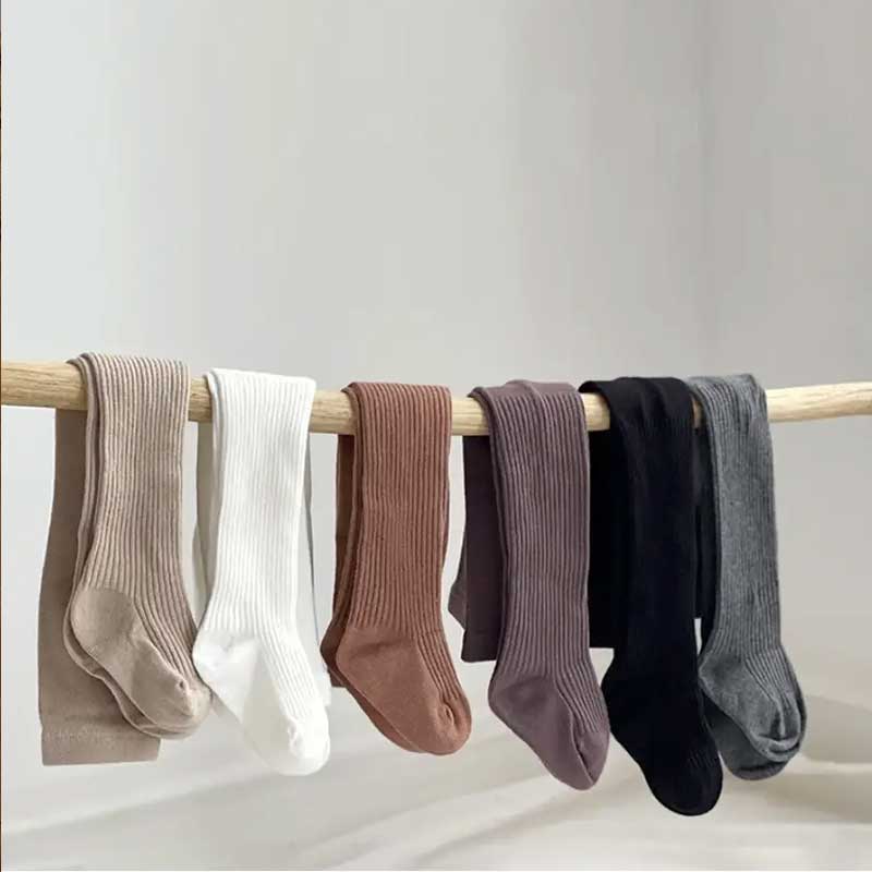An assortment of ribbed baby tights in delightful pastel colors, providing both warmth and style for your little one. The textured design adds a charming touch to these adorable and comfortable baby essentials.