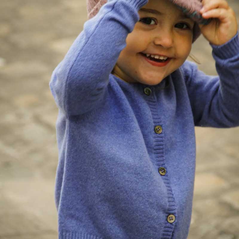  A cozy and elegant image showcasing "The Cashmere Bleutet Sweater," a luxurious garment in a beautiful shade of blue. Crafted from premium cashmere, this sweater offers comfort and style, making it a versatile addition to your winter wardrobe.