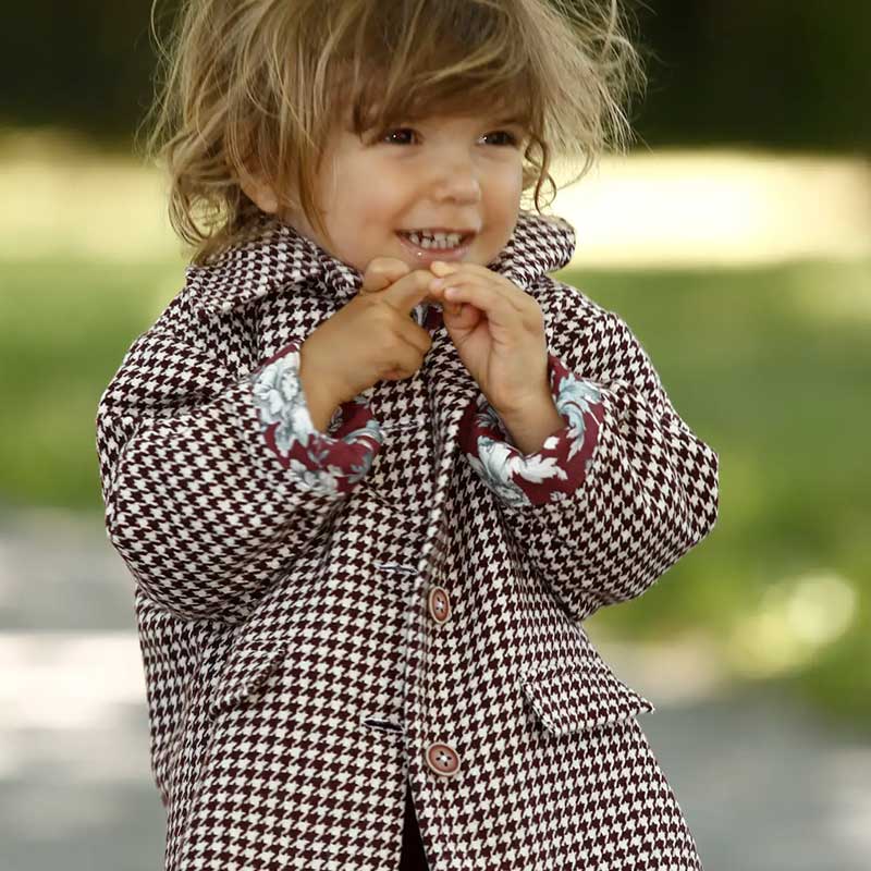 A stylish image featuring "The Checked Jacket," a classic piece with a modern aesthetic, showcasing a timeless checked pattern. This versatile jacket is the perfect blend of sophistication and casual charm, making it a must-have for any fashion-forward wardrobe.