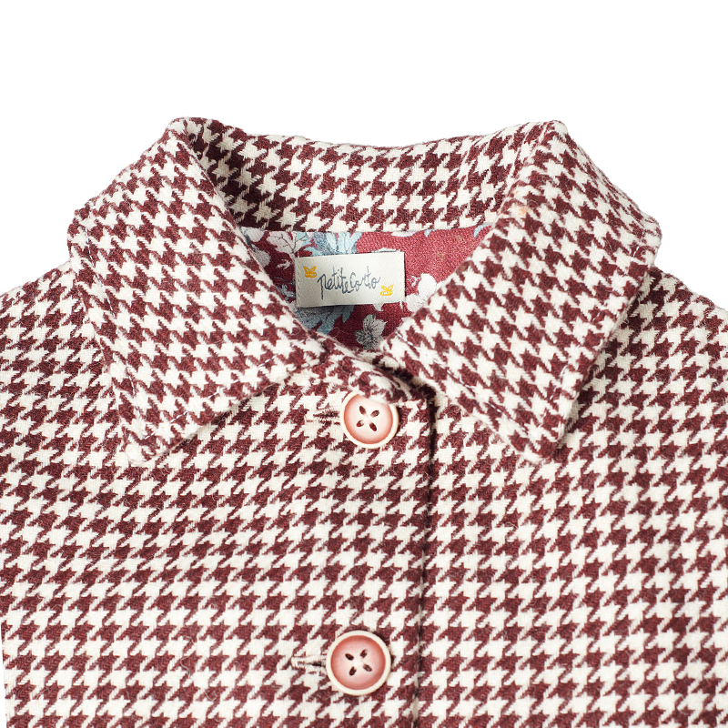 A stylish image featuring "The Checked Jacket," a classic piece with a modern aesthetic, showcasing a timeless checked pattern. This versatile jacket is the perfect blend of sophistication and casual charm, making it a must-have for any fashion-forward wardrobe.