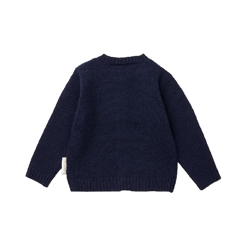 A sophisticated image highlighting "The Classy Cardigan," a garment that embodies effortless elegance with its refined design. This versatile cardigan adds a touch of sophistication to any ensemble, making it a wardrobe essential for timeless style.