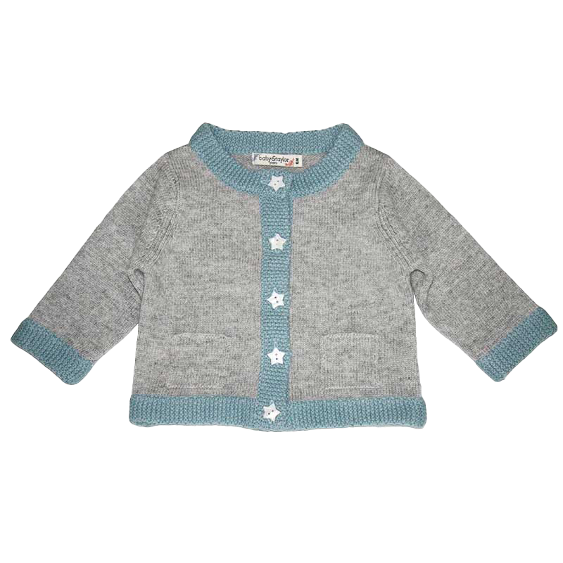An exquisite image featuring "The Camelia Cashmere Cardigan," a piece of timeless luxury adorned with delicate camelia patterns. Crafted from sumptuous cashmere, this cardigan radiates elegance and warmth, making it a statement piece for sophisticated occasions.